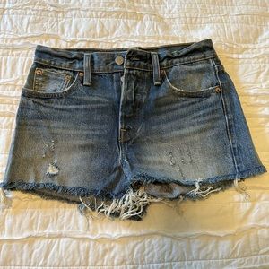 Size 25 Levi’s Denim shorts. NEVER worn. Super cute!